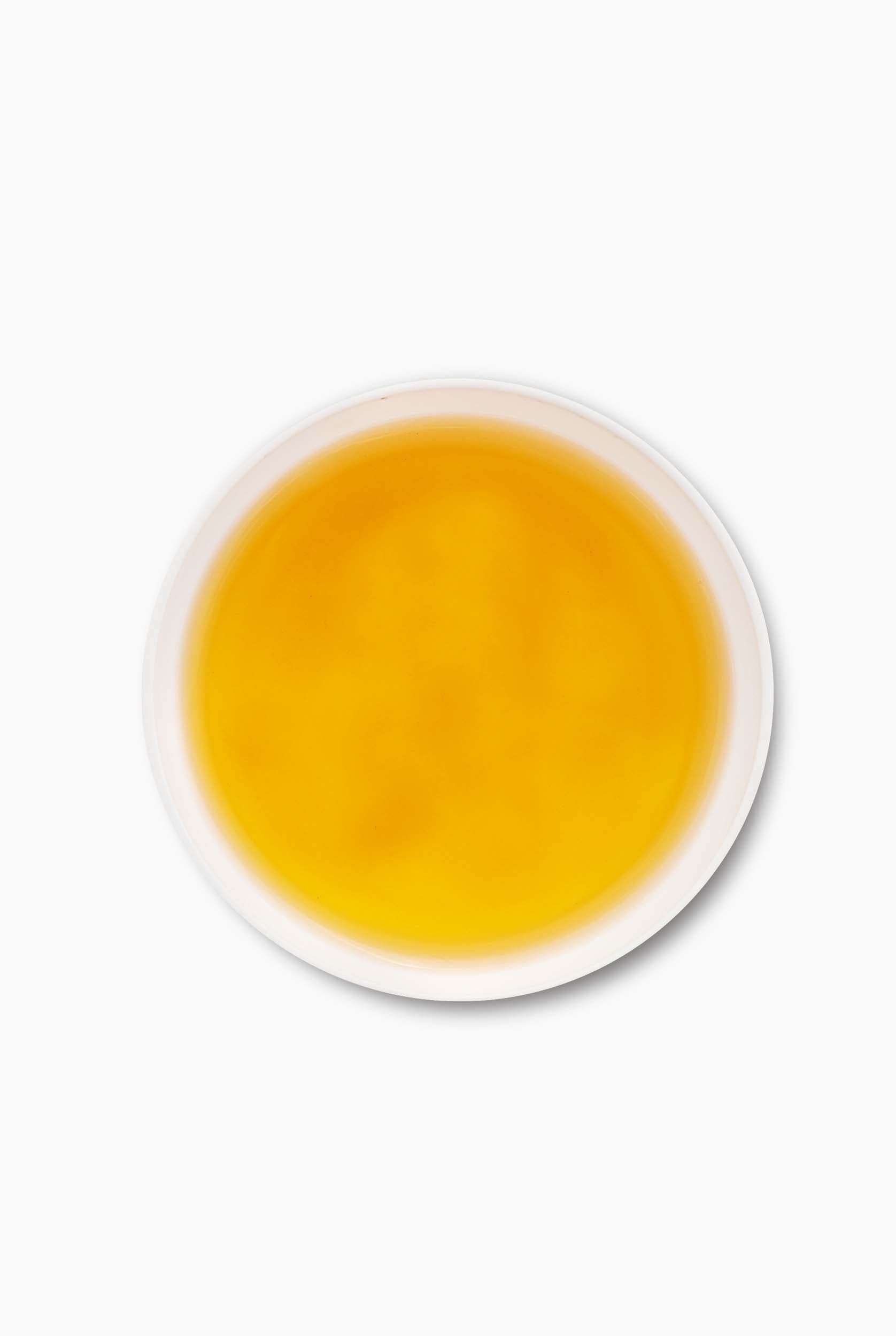 A Bright Golden Liquor describes - Moonlight White Tea from Darjeeling